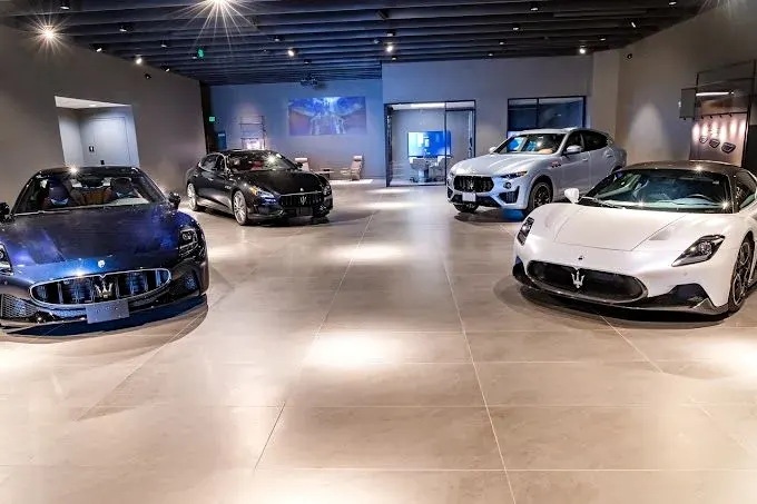 Large-format porcelain floor in a luxury car showroom